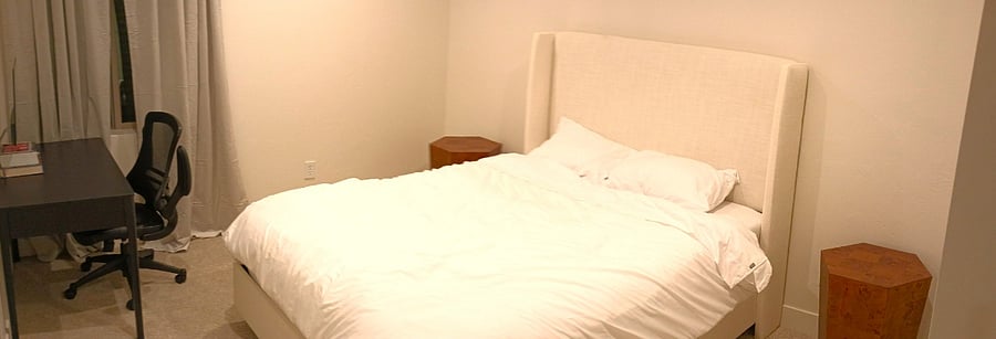 downstairs queen bedroom with desk