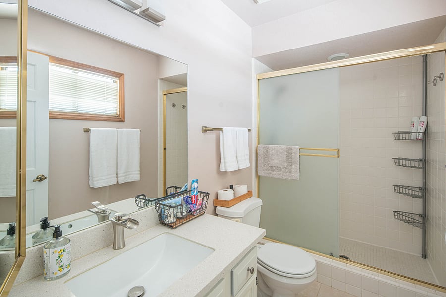 upstairs bathroom with walk in shower