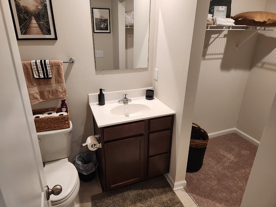 Main bathroom equipped with walk-in closet. Hangers along with extra towels and linens included.