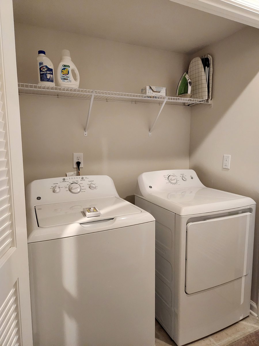 Washer and dryer located on Level 3 with detergent and dryer sheets included. Iron and ironing board also stored in this closet.