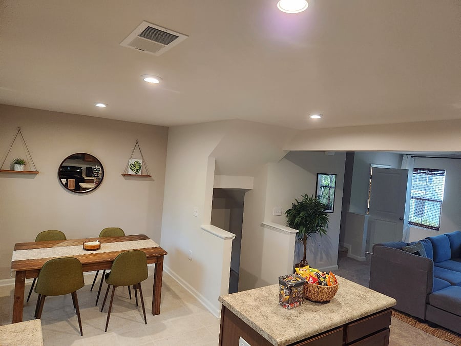 Spacious living room and dining area view from kitchen