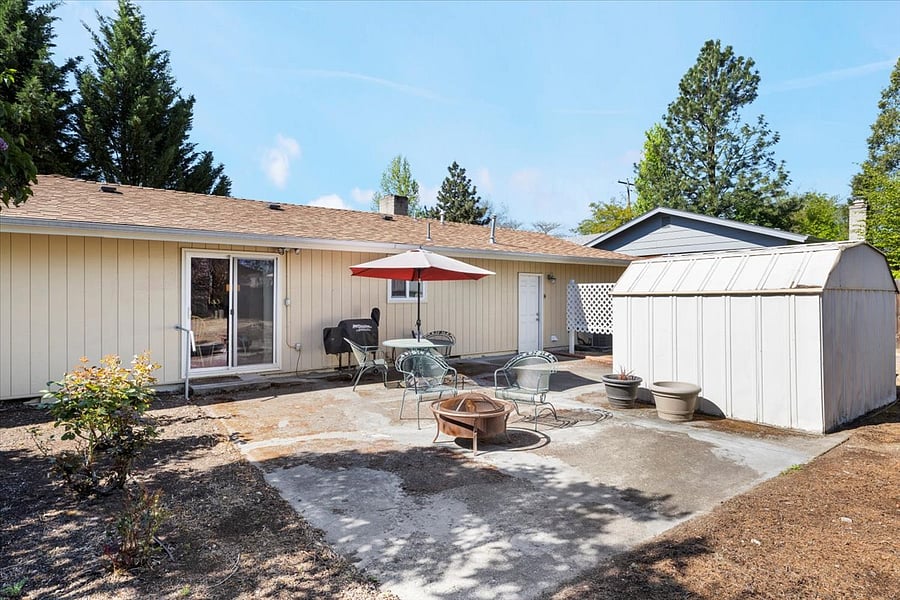 Traeger, shed, and firepit included for your enjoyment!