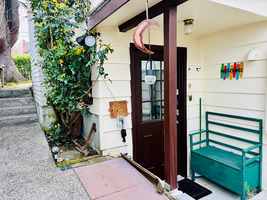 Front door to Retreat. Bench to sit and remove shoes, hook for wet coats & umbrellas above the bench. Please enjoy the many amenities, but do not remove from the Retreat.