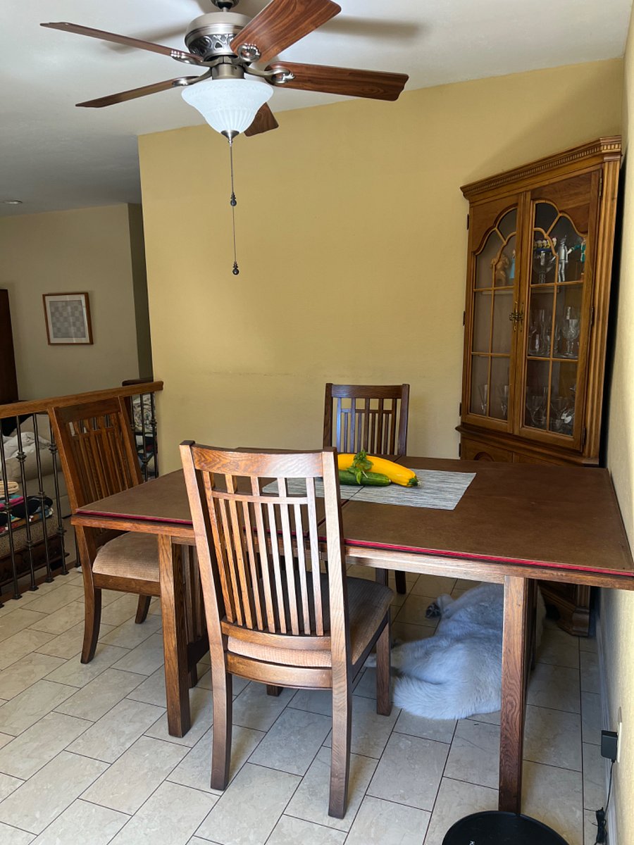 Dinning room is located between the family room and the kitchen.