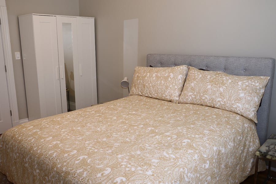 Bedroom 1 Gold room suite with TV and Private Bath