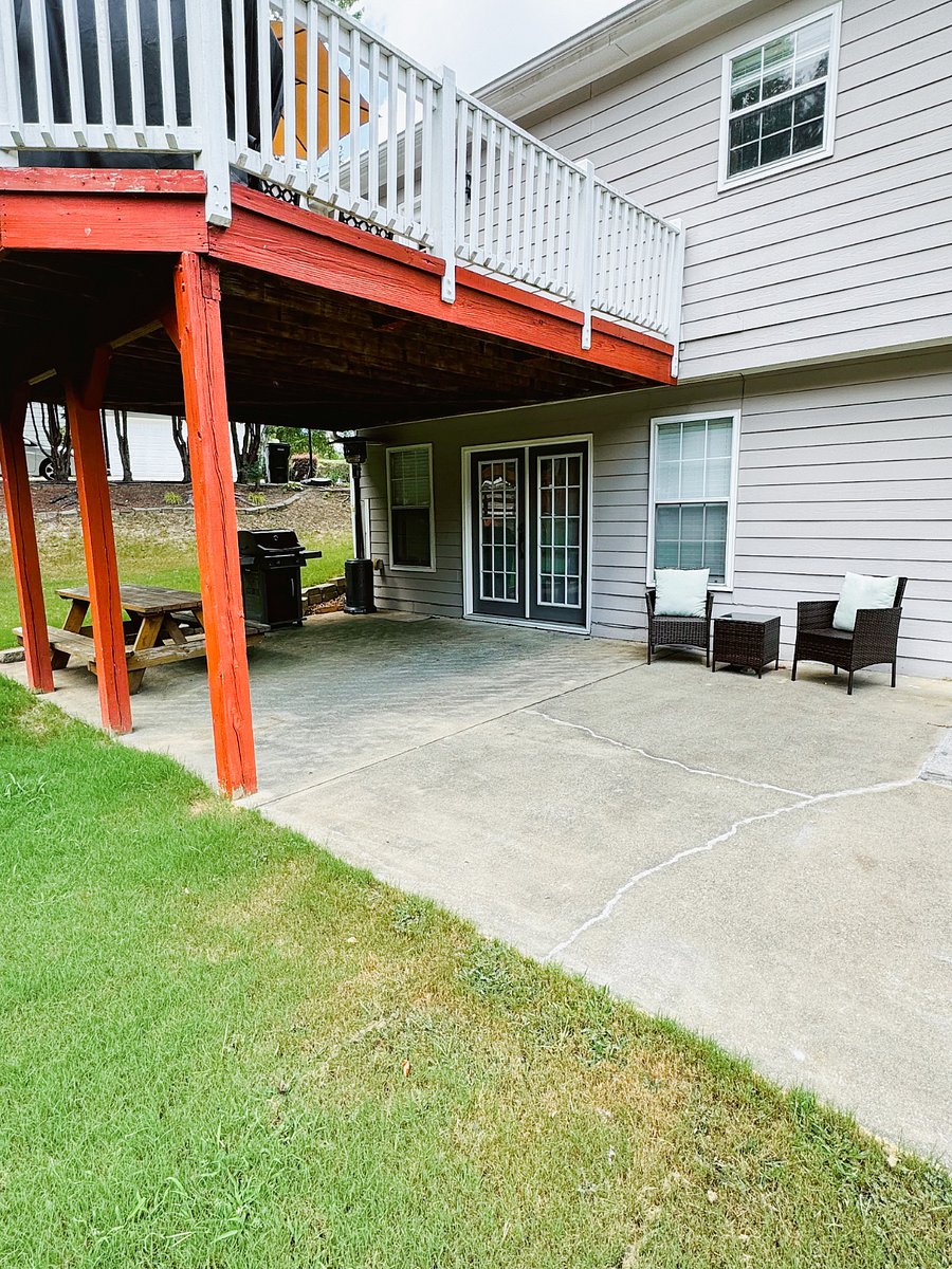 Apartment has its own private back patio area that is partially covered. Includes a picnic table and a bistro table set.
