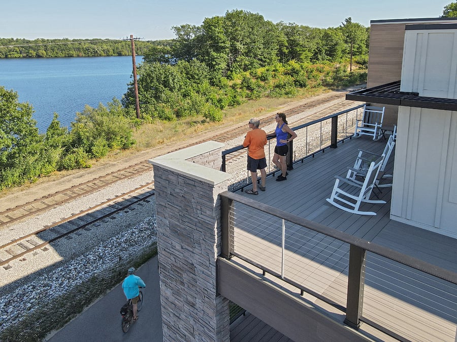 Wrap around balcony with sweeping views of Boardman Lake. 