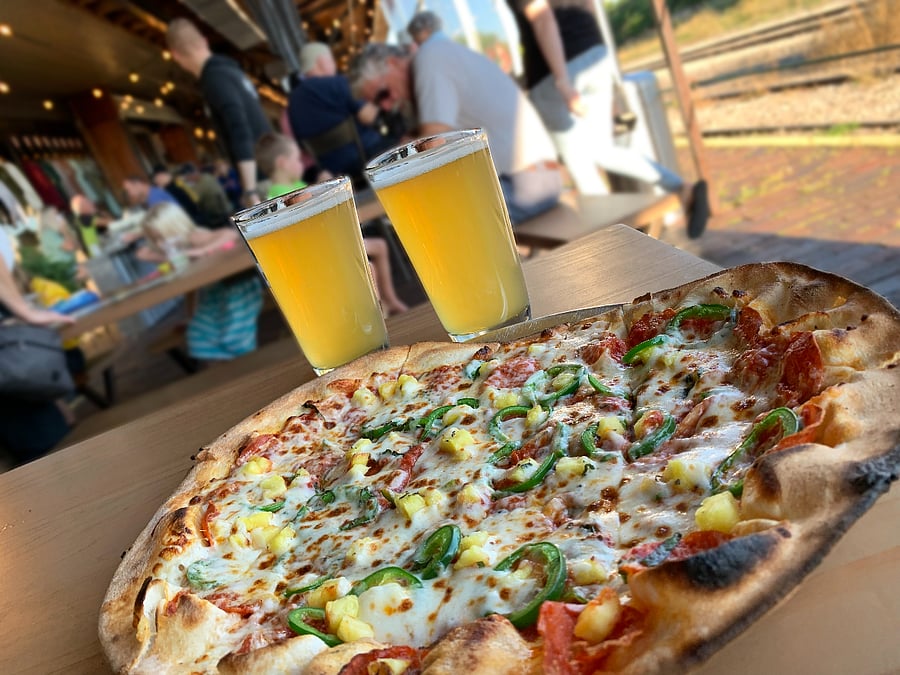 The Filling Station has delicious wood fired pizzas and craft beer. 