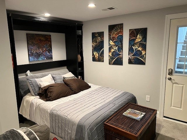 Murphy bed, queen sized. USB plugs and touch lamp with 3 settings. Book swap, games, lock box for personal documents with key.