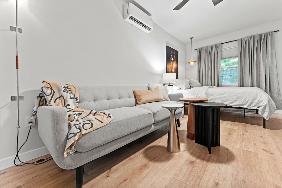 Stacked coffee tables mean flexibility.  Easy to move to add space if needed. The mini-split means you can control the temperature at all times.  Cools just like a hotel 
