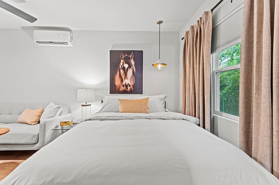 Quality bedding including a new mattress, Black out curtains and shades for day sleepers. 