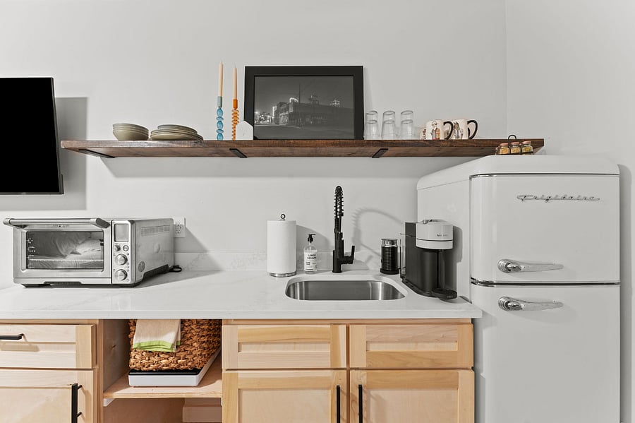 Other appliances include a Nespresso machine, Kitchenaid toaster oven with air fryer and hot plate for stove-top. 