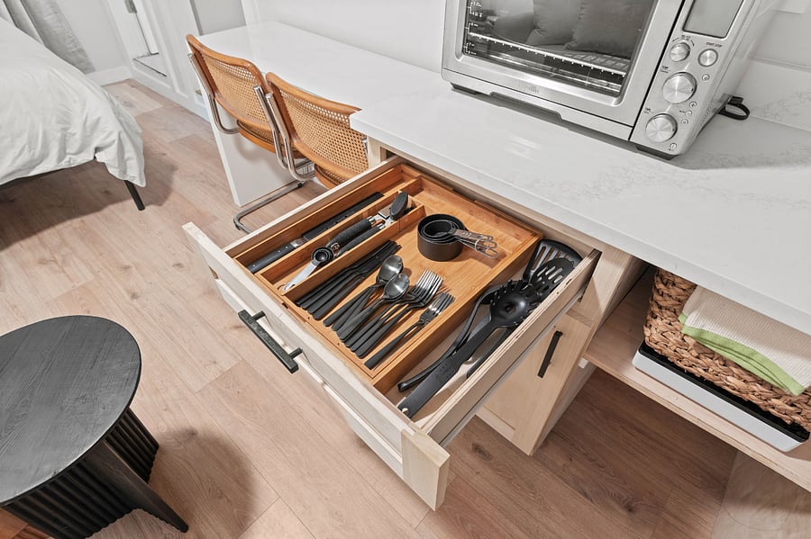 Kitchen gadets like can opener and utensils for simple meals. 
