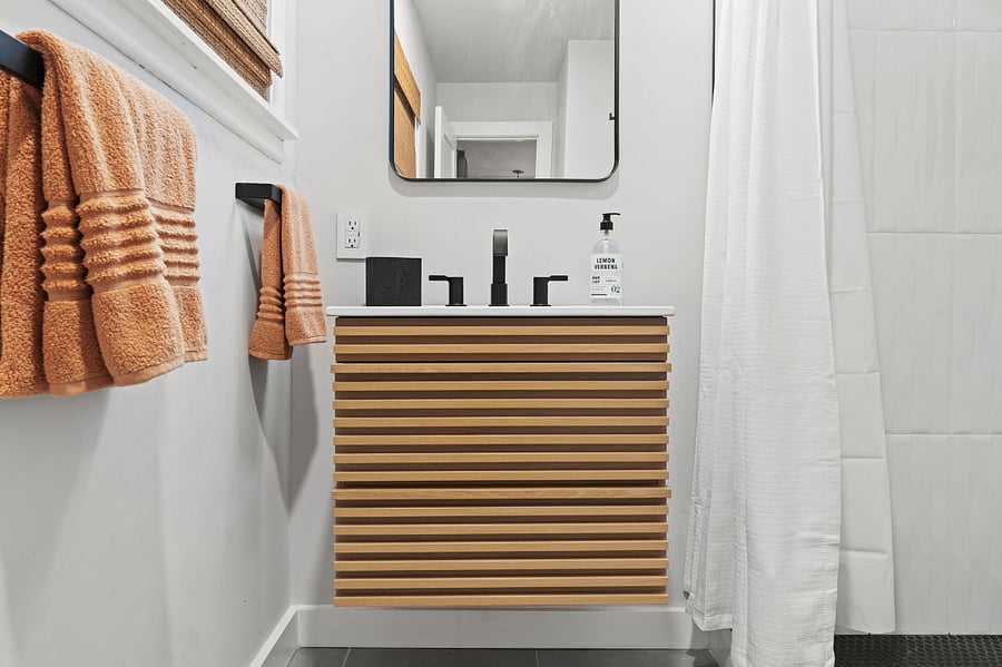Floating vanity has drawers for storage! 