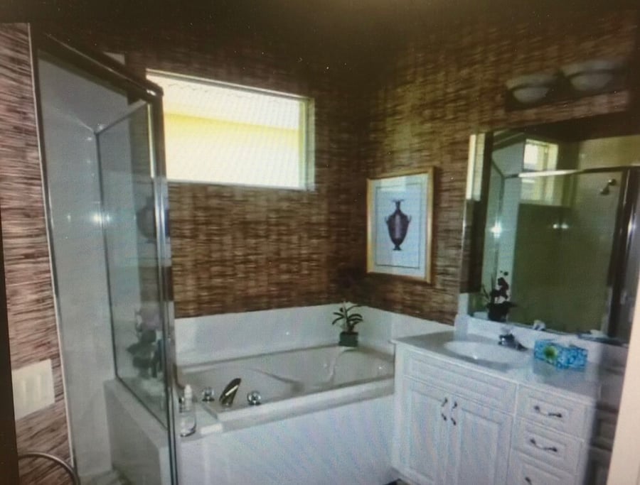 Primary bathroom with walk in shower & bath tub