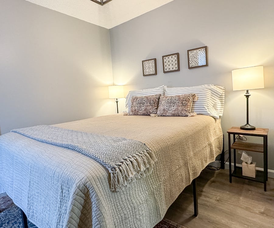 Bedroom with queen bed complete with linens. Large bureau and closet.