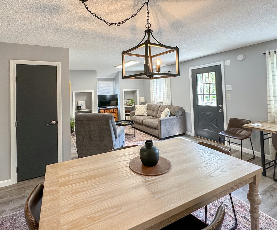 Spacious dining table seats 6. Living room complete with full pull out couch for your guests. Complete with Smart TV and games.