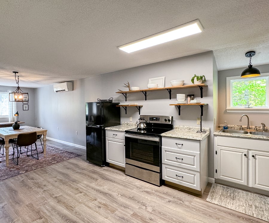 Dining room just off the full kitchen. Open concept. Pantry in kitchen.