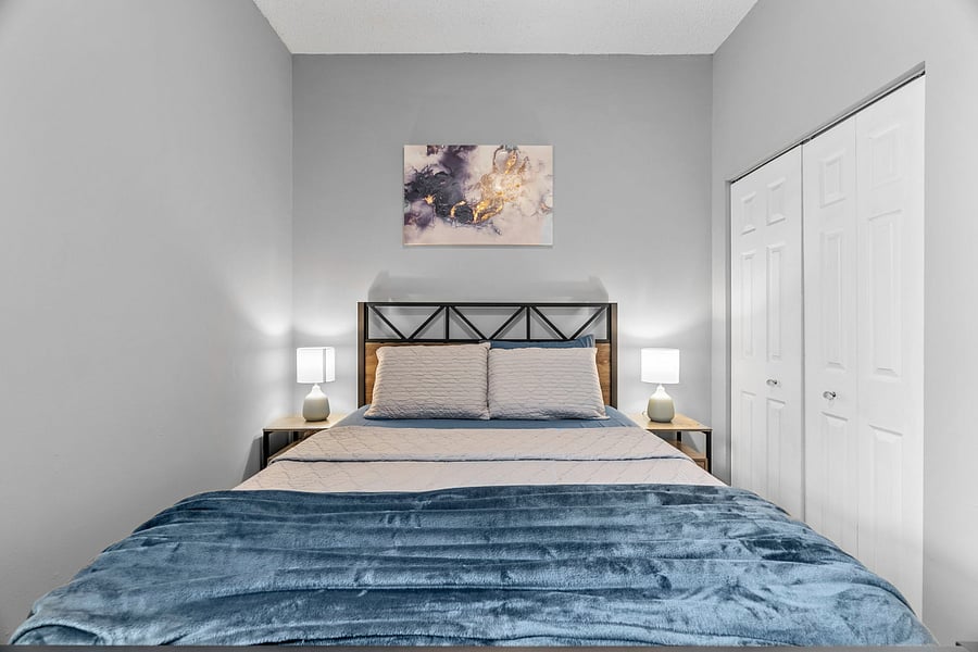 2nd bedroom with queen bed and 100% black out curtains