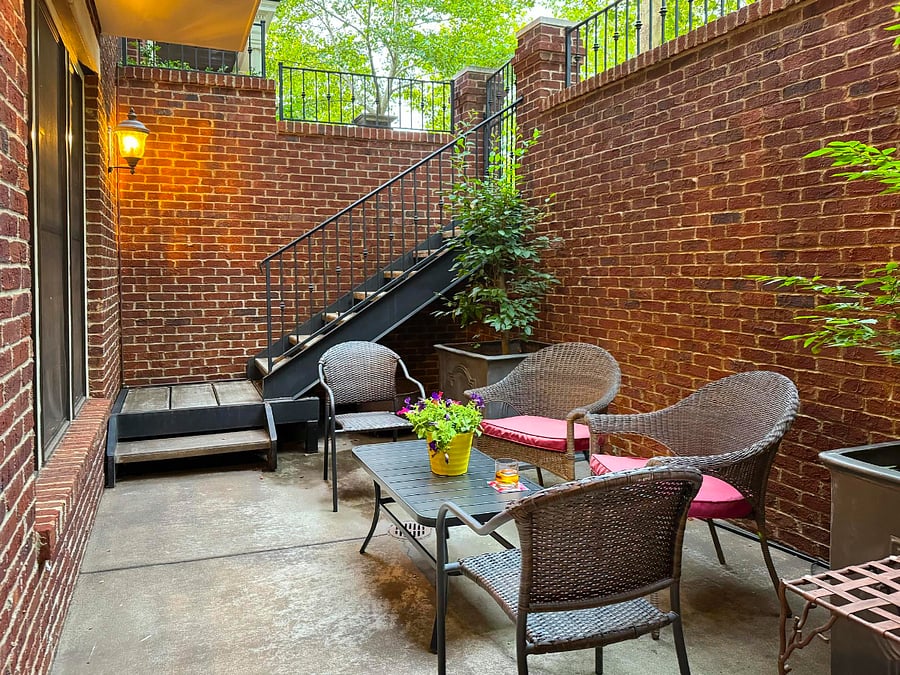 Privacy abounds for cocktail hour in the brick enclosed courtyard.