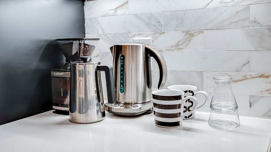 A Cuisinart Burr Coffee Bean Grinder, a Mueller French Press Double-Walled Insulated French Press and a Breville Hot Water Kettle combine to start your days off right!