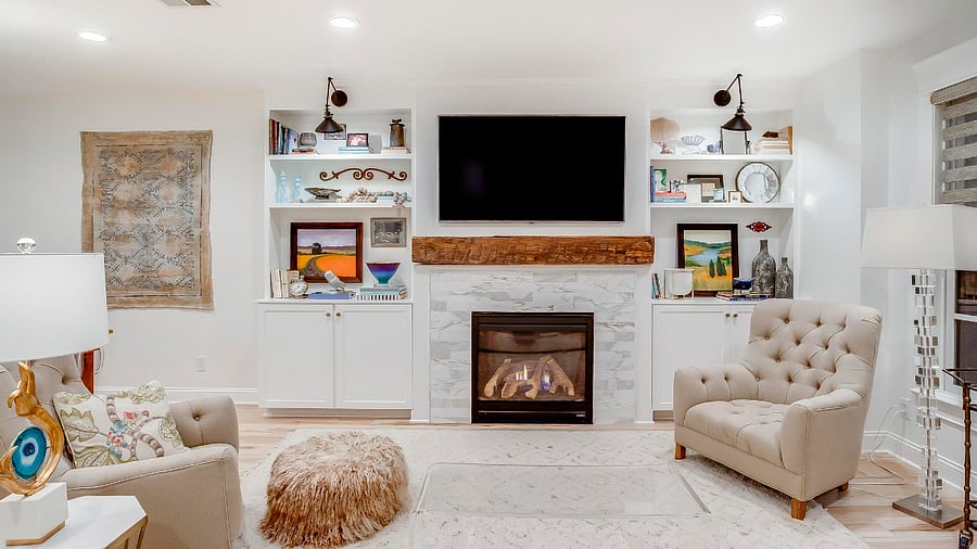 A visual extravaganza with gorgeously appointed bookshelves and a large TV, equipped with Roku. Customize your TV viewing with your favorite apps!
