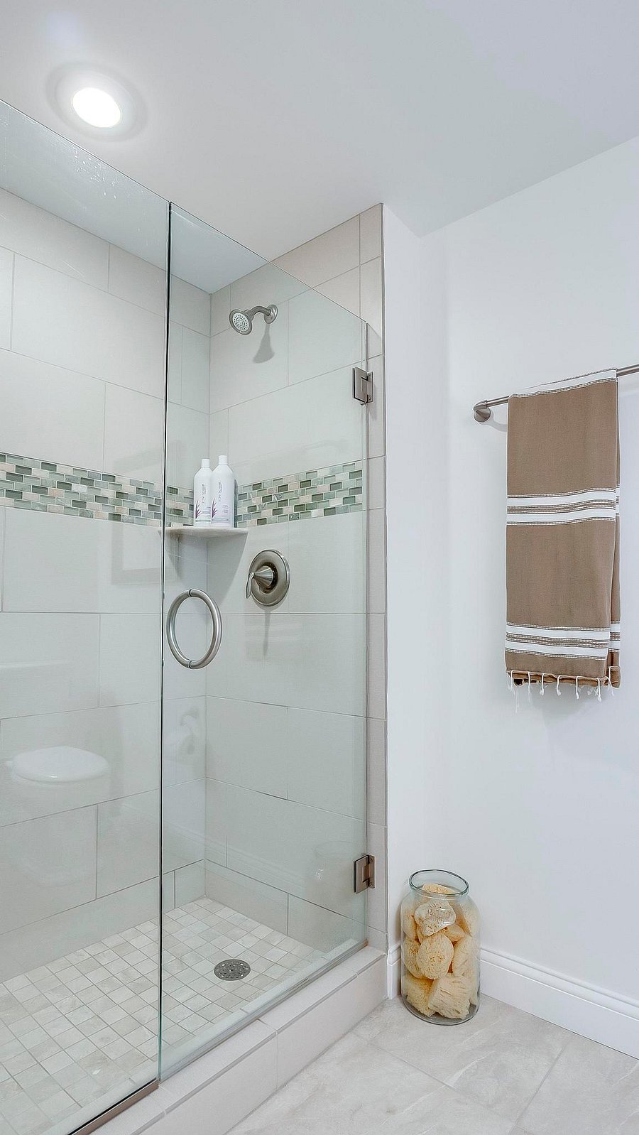 A large walk in shower with amazing water pressure for blissful showers.