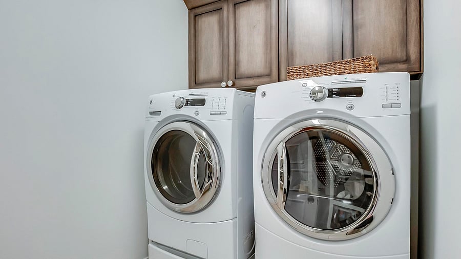 High end front loading washer and dryer. Laundry essentials are provided.