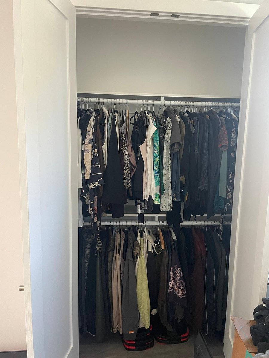 Large Closet - with it filled so you can get an example of how many clothes you can fit!