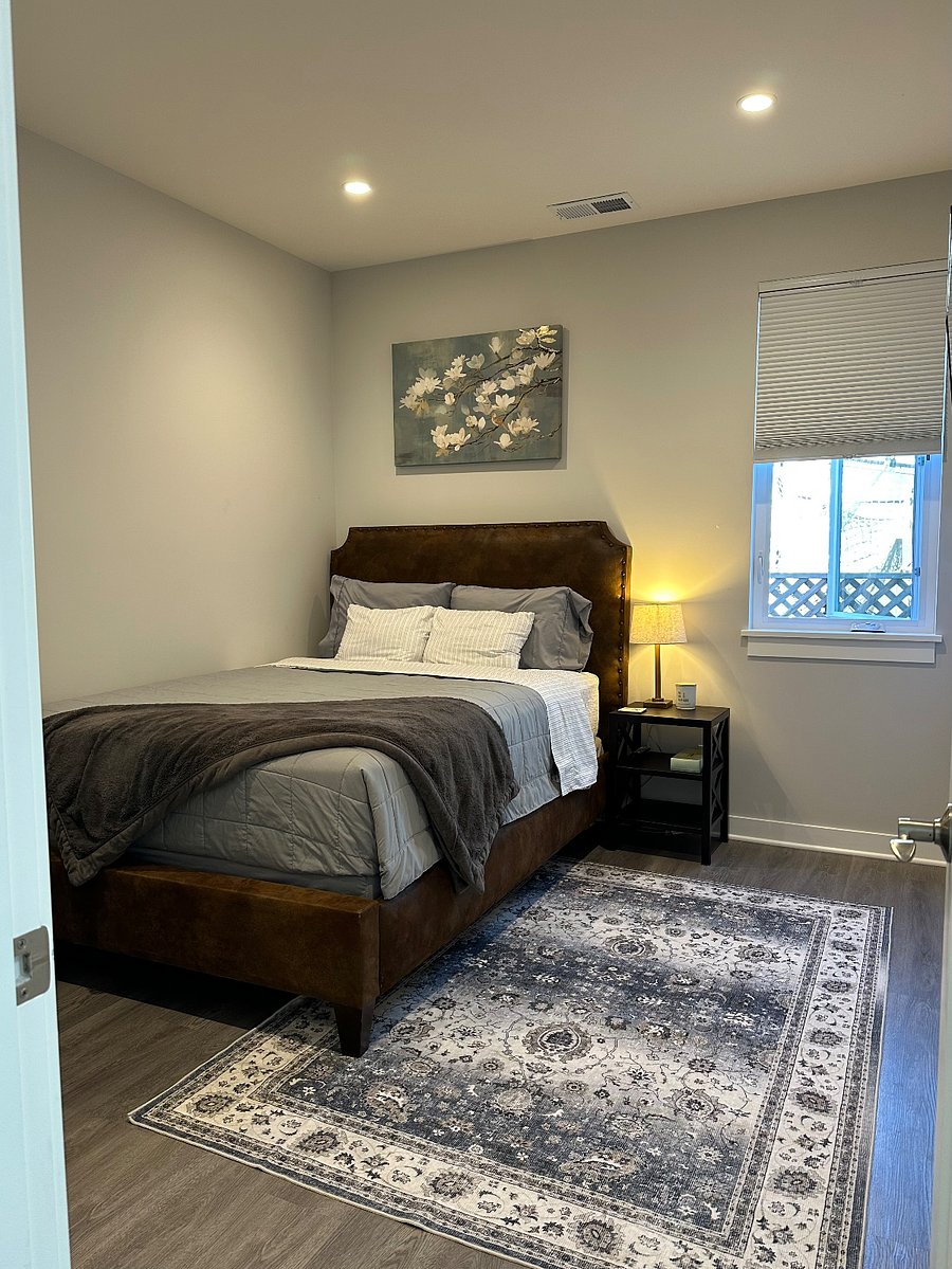 Comfortable newer Sealy bed with lots of natural light and a blackout blinds