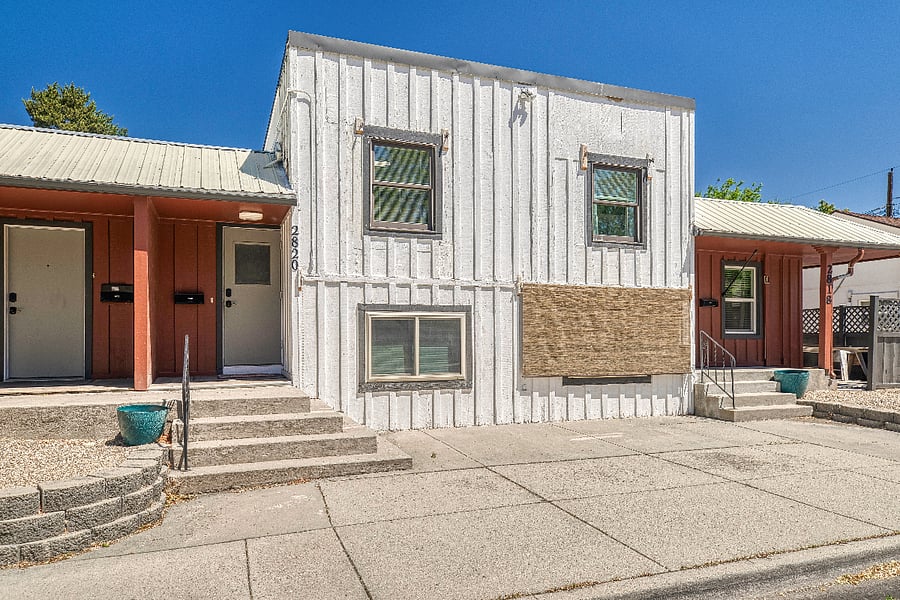 The front door for 2820 is located front and center, of the building! It has a light above the entrance for late night arrivals and is covered so you don't ever have to worry about getting snowed in!