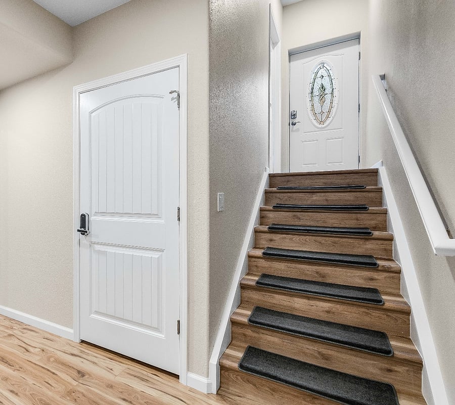 Private entry with stairs to the private apartment.