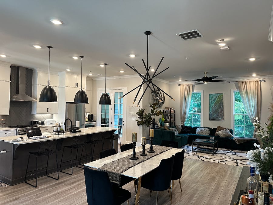 Large open plan main floor, living room, dining room, kitchen, sitting room and powder room, plus two deck areas off kitchen