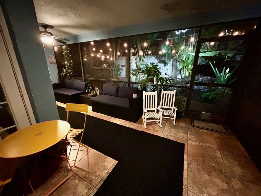 Screened in porch with ceiling fans & lighting
