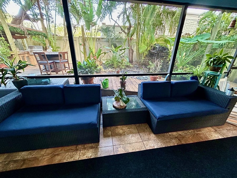 Screened in porch with ceiling fans and lighting
