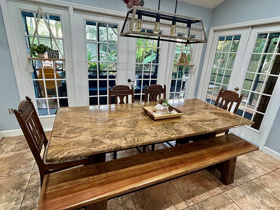 Beautiful granite oversized dining room table with bench & chair seating for 8