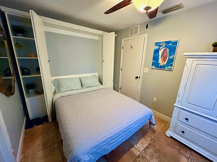 3rd bedroom functions as an office or bedroom with easy-to-open queen murphy bed.