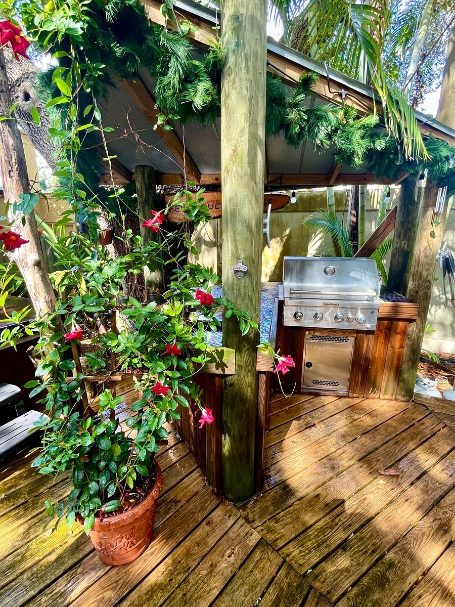 Covered outdoor kitchen with propane grill