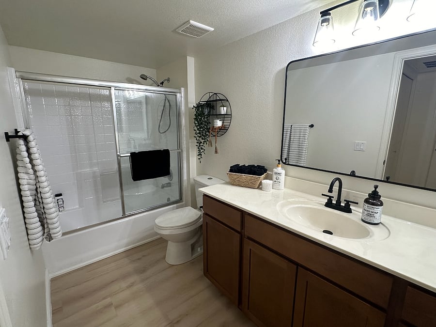 Large bathroom with tub and shower