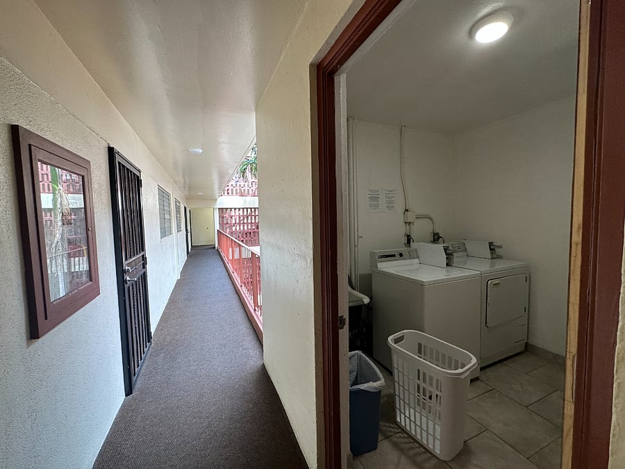 Laundry about 10 steps from condo.
