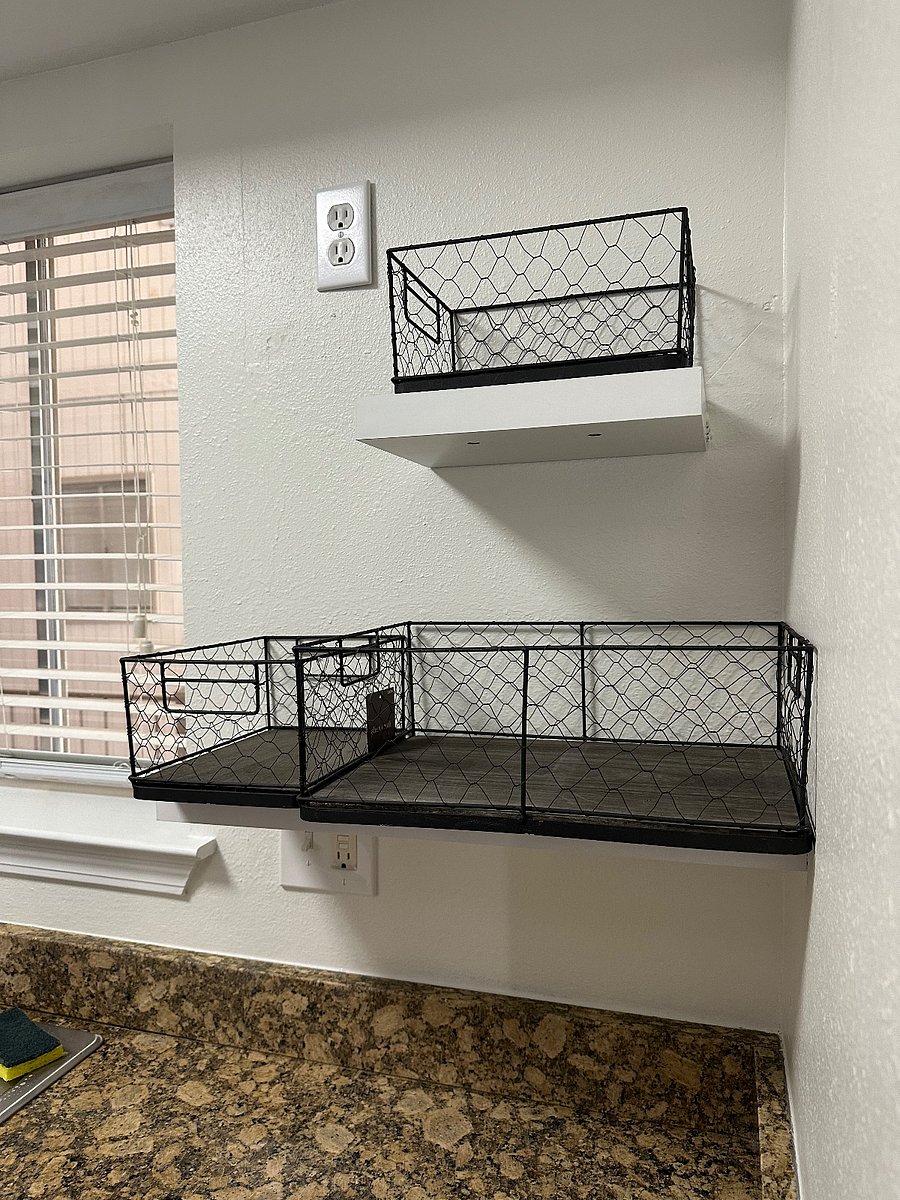 Egg baskets for onions and such in kitchen