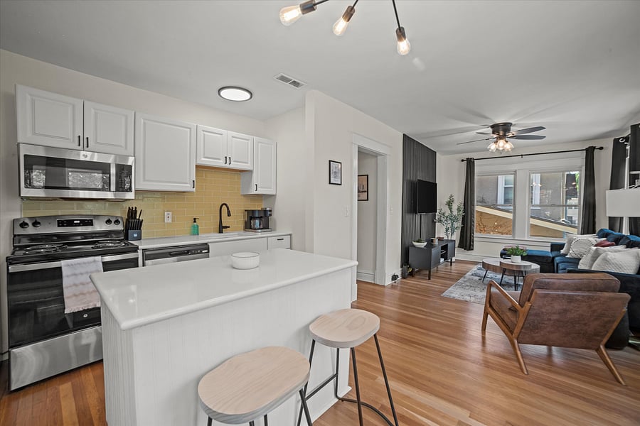 Indulge your culinary aspirations in our fully-equipped kitchen, where modern elegance meets functionality. From sleek countertops to state-of-the-art appliances, every detail is designed to inspire your inner chef. Whether you're whipping up a quick meal or preparing a gourmet feast, this kitchen offers the perfect blend of style and convenience. Embrace the joy of cooking in a space that's as beautiful as it is functional.