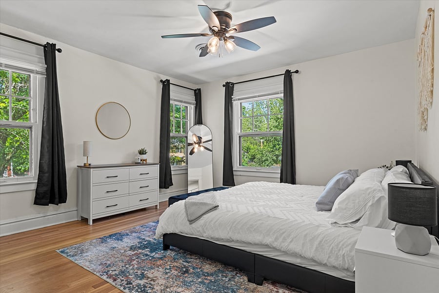 Indulge in the spacious comfort of our king bedroom, complete with a full-size mirror and dresser. Experience convenience and style as you prepare for the day ahead or unwind in the evening. Your perfect retreat awaits.