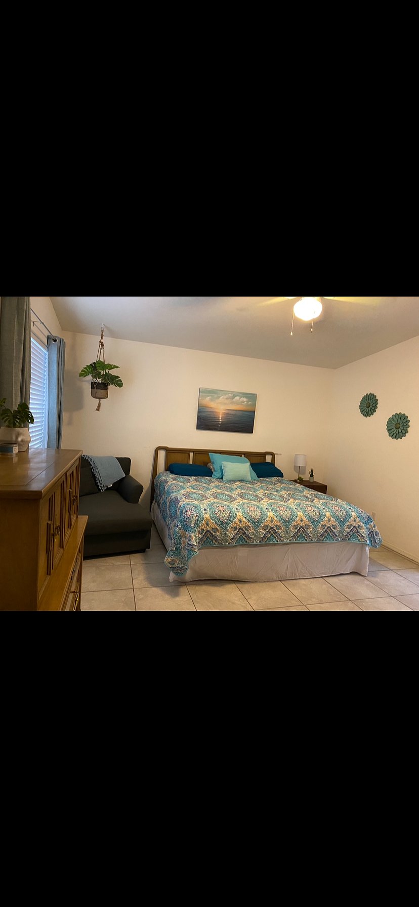 Master bedroom with king-size bed 55 inch screen TV. Also master bathroom with shower
