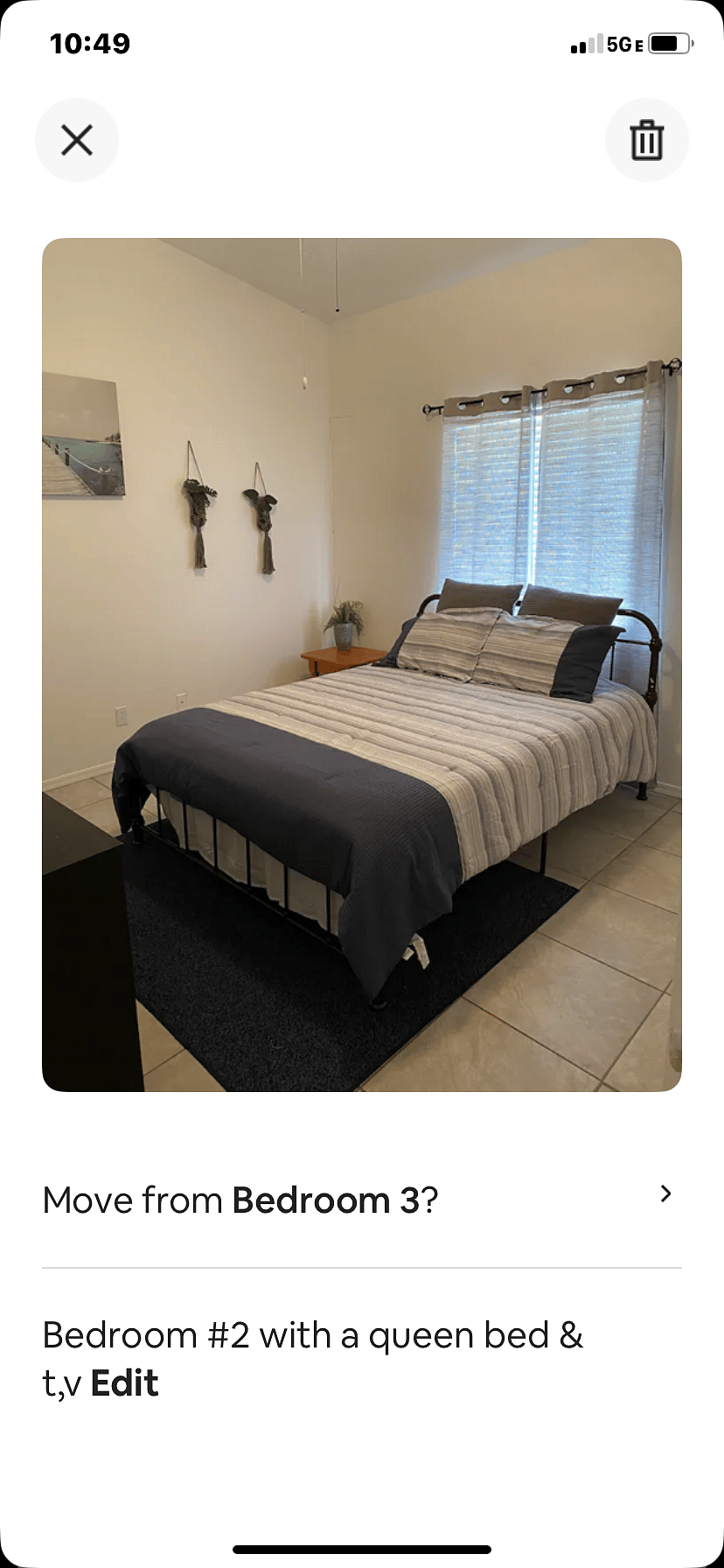 Bedroom with queen size bed. This room also has a TV.