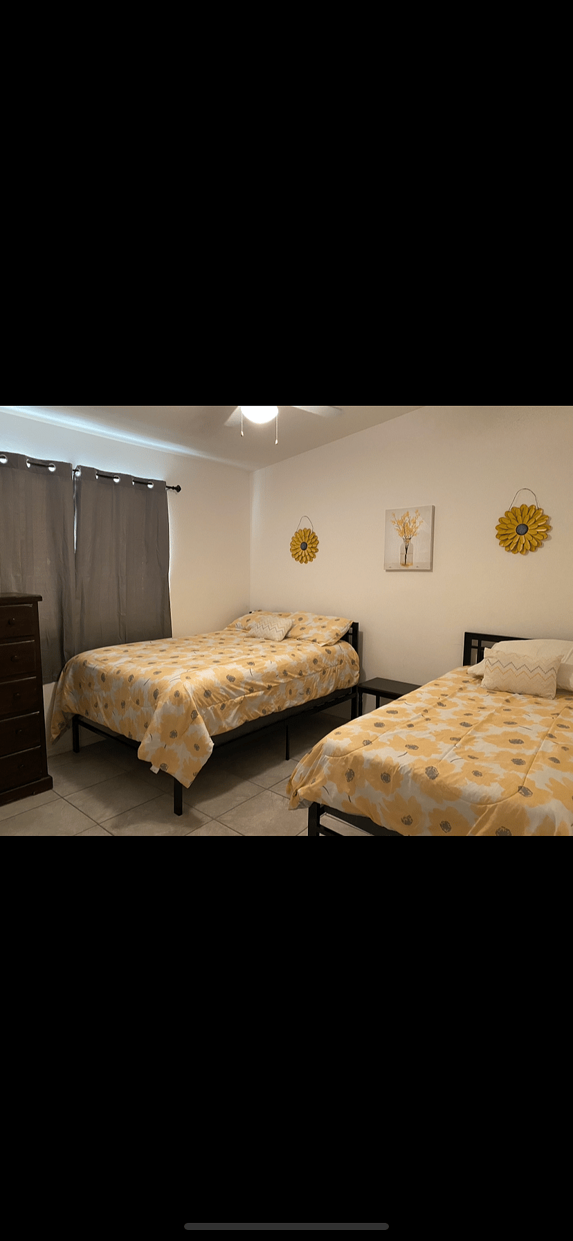 Second bedroom with one double bed and one twin bed