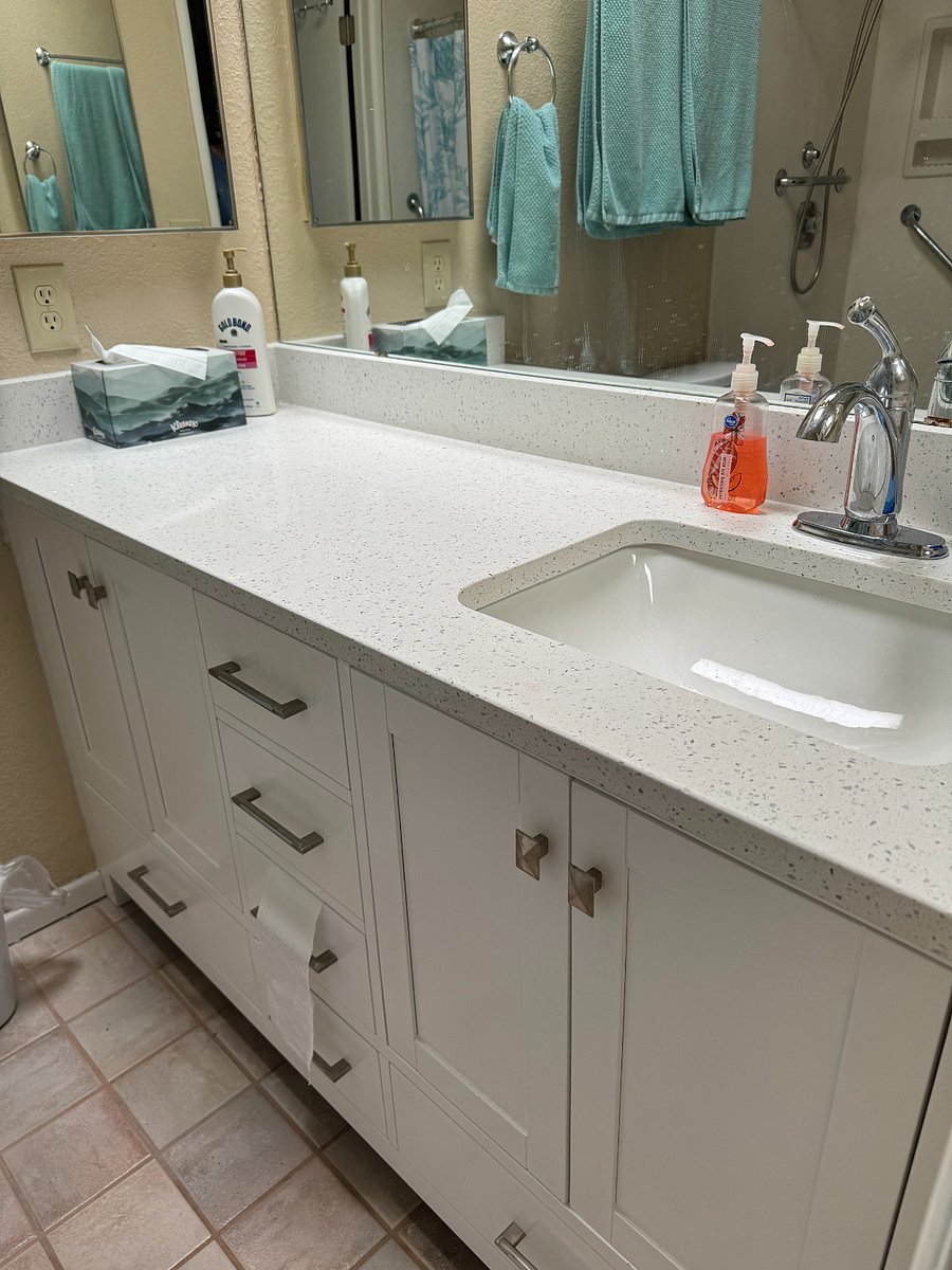 En suite bathroom with plenty of counter space,