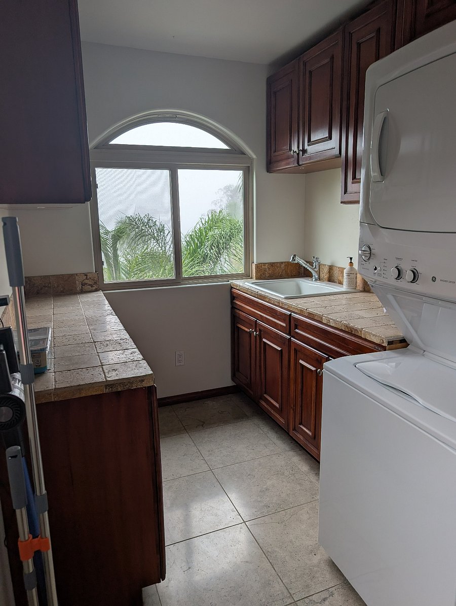 Laundry room with additional storage