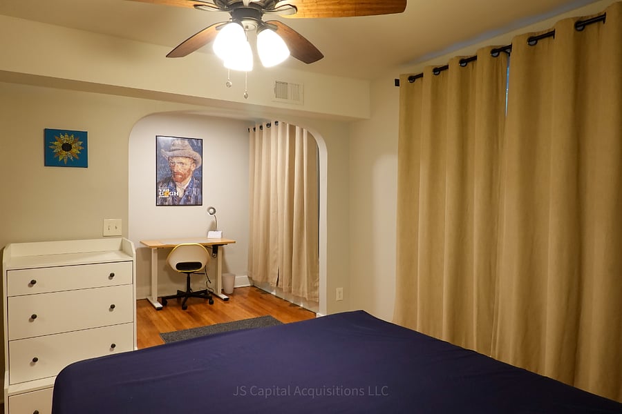 Bedroom 1 - dresser, sit/stand adjustable desk
