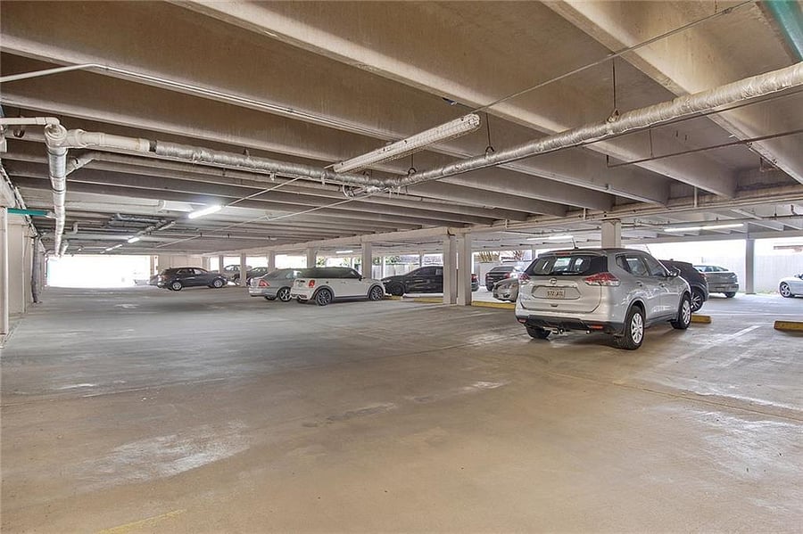 gated, covered parking on first floor of building